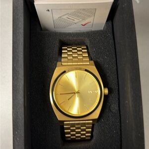 Nixon time teller gold watch